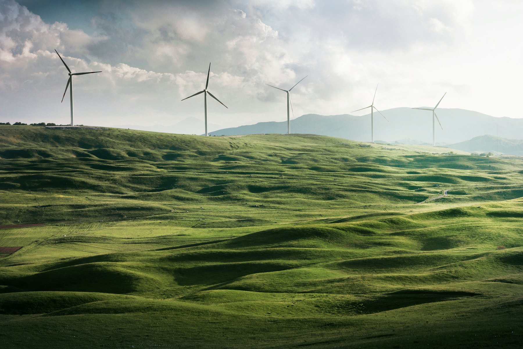 Wind turbines at sunset above the Dutch landscape